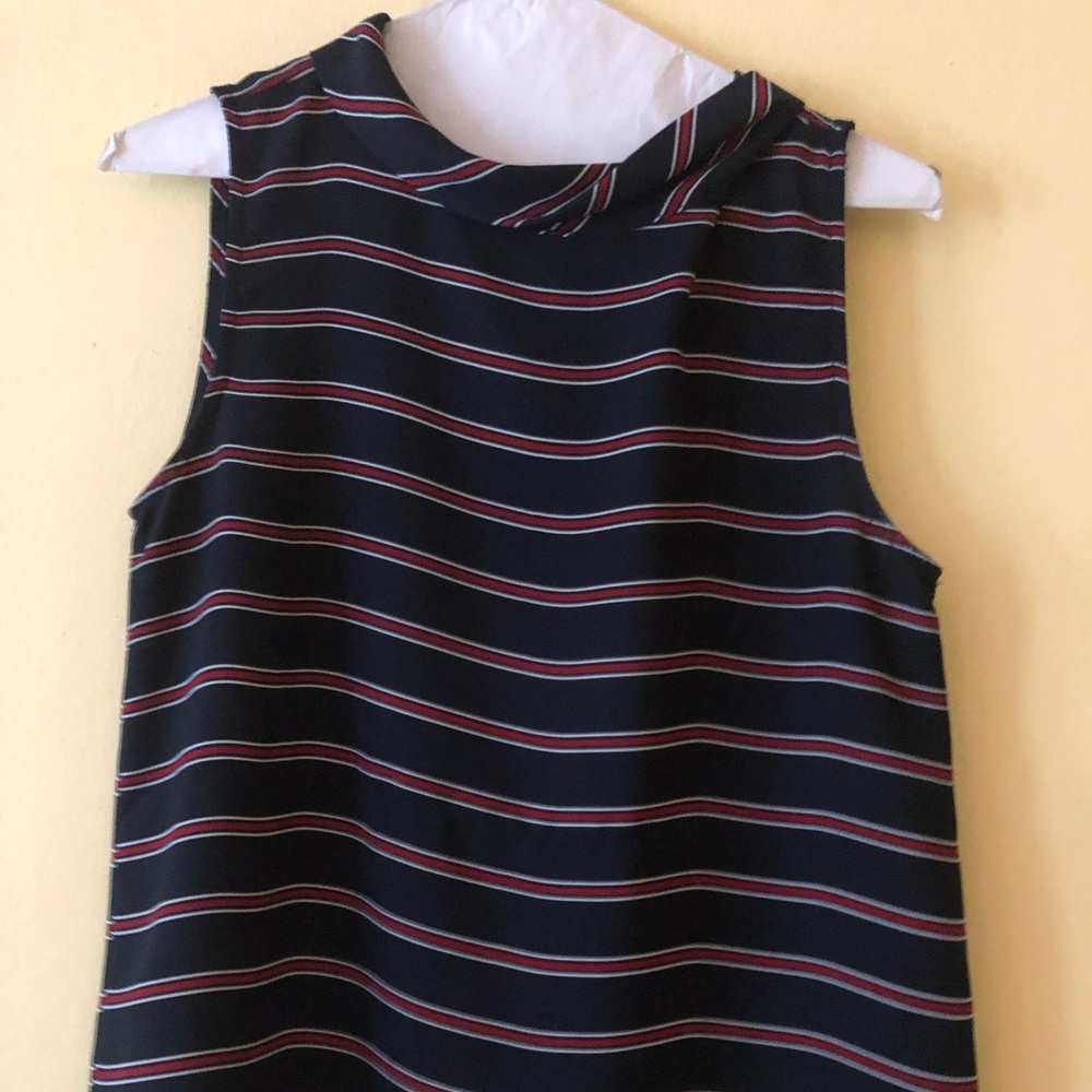 Sleeveless red white and blue blouse